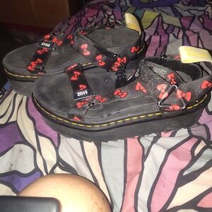 Dr. Martens Black Platform Sandals with Red Bow Print